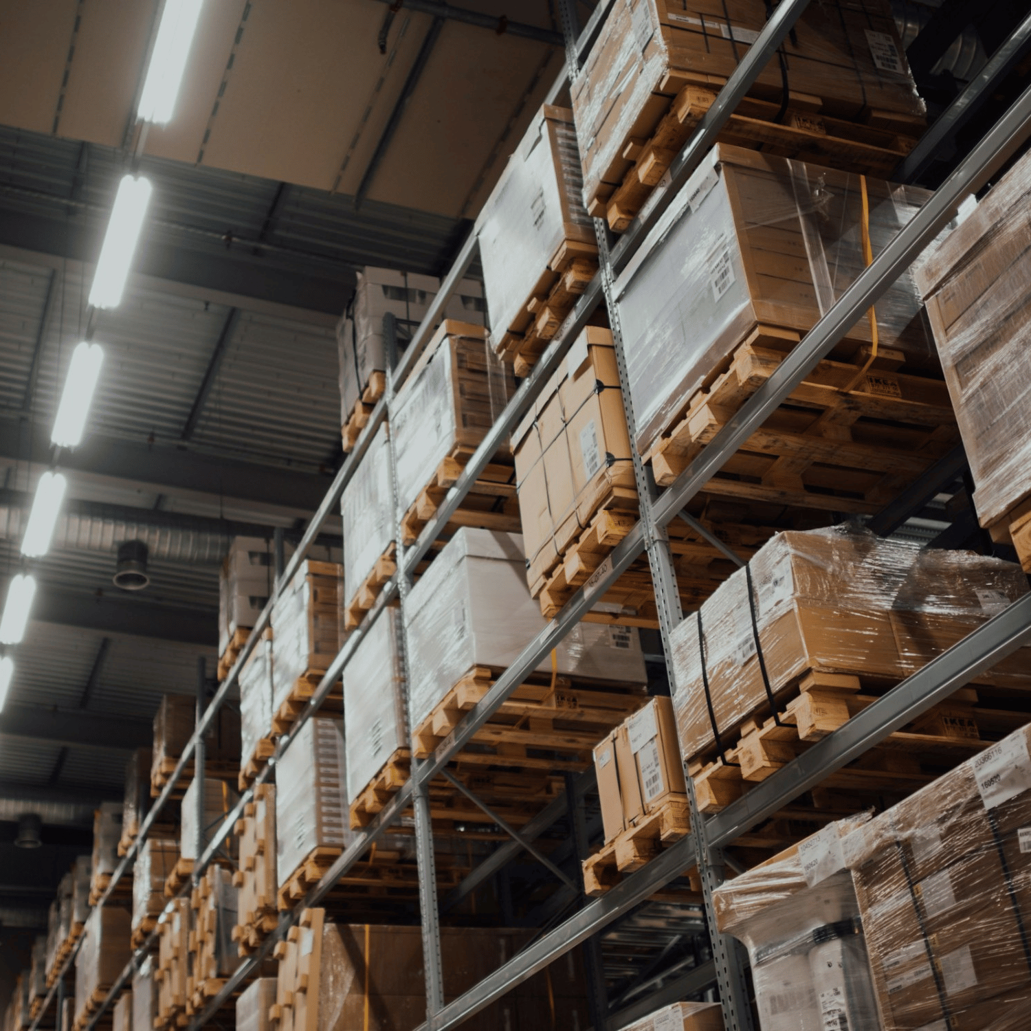 custom netting solution to keep boxes from falling off shelf in warehouse